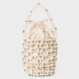 Mini embellished pearl bucket bag
